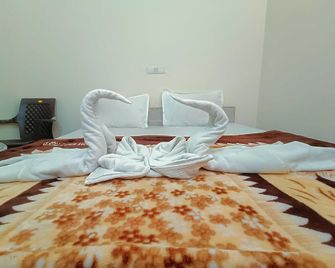 Hotel O C Hotel Pride Inn - Meerut - Bedroom