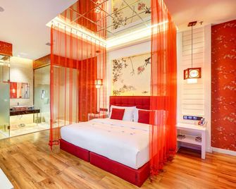 Five Leaf Clover Boutique Hotel (Harbin Haxi Wanda Plaza) - Harbin - Slaapkamer