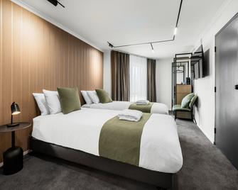 داونتاون موتل وارنامبول - ورّنامبول - غرفة نوم