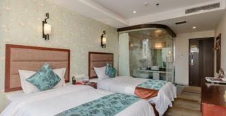 Yuanhua Hotel - Liangshan - Schlafzimmer
