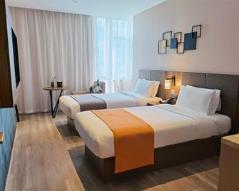 Home Inn Plus Beijing South Station Wanda Plaza - Beijing - Bedroom
