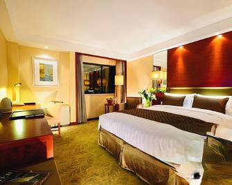 Jianguo Hotel - Xi'an - Κρεβατοκάμαρα