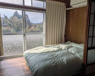 K's guest house - Hostel - Ibusuki - Bedroom