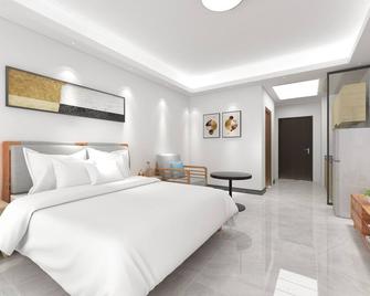 Foshan Laide Apartment - Foshan - Schlafzimmer