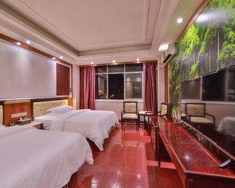 Pu'er Win-win Hotel - Pu'er - Bedroom