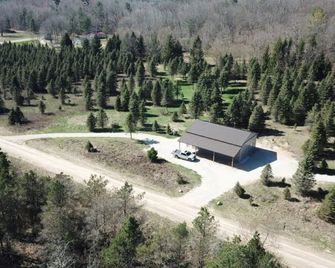 4 Private RV Campsites surrounded by 'Knotty Pines', Minutes from ORV Trails. - Luther - Vista del exterior