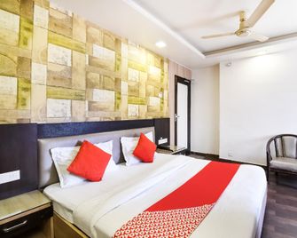 Capital O Hotel Kanishka - Raipur - Habitación