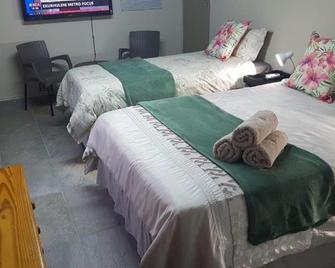 Nkwasi Lodge - Parys - Bedroom