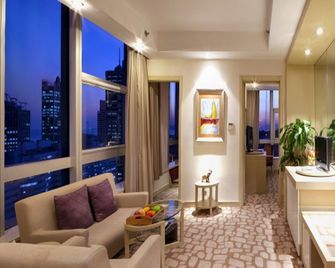 Ariva Qingdao Hotel Serviced Apartment - Qingdao - Sala de estar