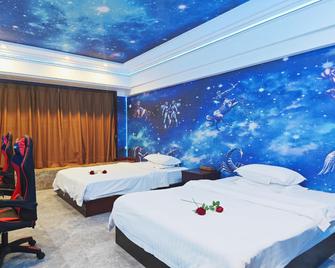 Zhuji Hotel Nanxiong - Shaoguan - Schlafzimmer