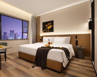 Mehoodlestie(Nanning Dongge Road Metro Station Store) - Nanning - Bedroom