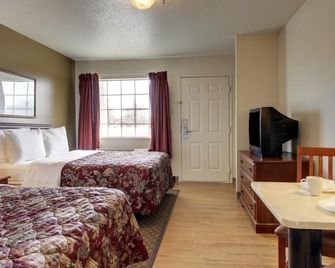 Intown Suites Extended Stay Select New Orleans La - Harvey - הארווי - חדר שינה
