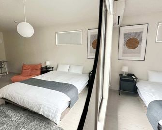 10 mins to Kumamoto Airport Premium 4BR Retreat by Restavio - Ōzu