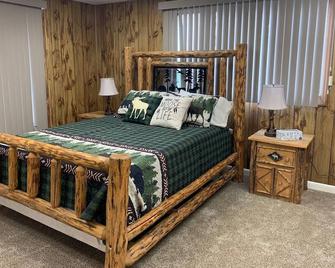 The Eagle's Nest is an oilfield building converted into a beautiful house right on the river. - Thermopolis - Bedroom
