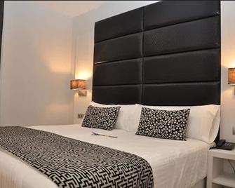 Hotel Selu - Córdoba - Bedroom