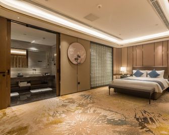 Mianyang Kefa The Qube Hotel - Mianyang - Schlafzimmer