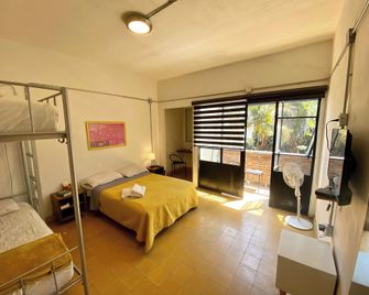 Hostel Hospedarte Chapultepec - גוואדאלחארה - חדר שינה