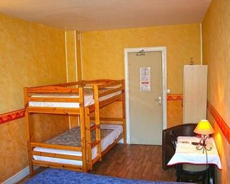 La Caravelle - Riom - Schlafzimmer