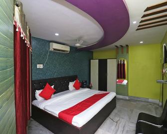 OYO 18490 Hotel Jagannath International - Titāgarh - Bedroom