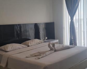 Hani Guest House - Bandar Lampung - Habitación