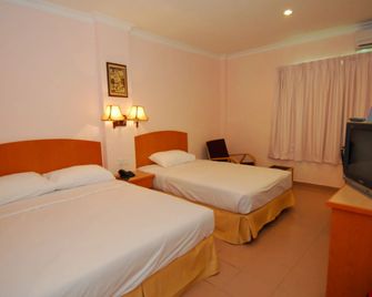 城市之星酒店 - 山打根 - 臥室