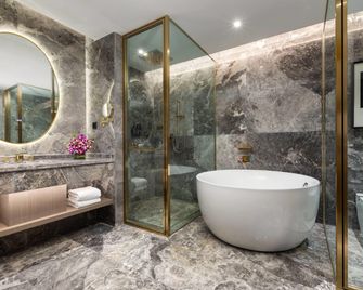Lijiang Caizu Holiday Hotel - Lijiang - Baño