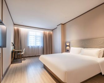 Hanting Hotel Jining Taibailou - Jining - Bedroom