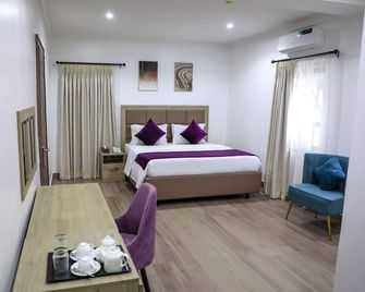 Quest Boutique Hotel - Abuja - Makuuhuone