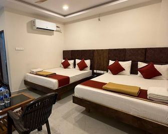 Arudra Residency - Tiruvannāmalai - Camera da letto