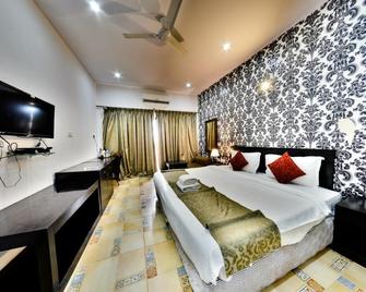Sanskruti Resort Gokarna - Gokarna - Schlafzimmer