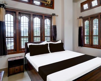 Spot On Sm Lodge - Gauhati - Schlafzimmer