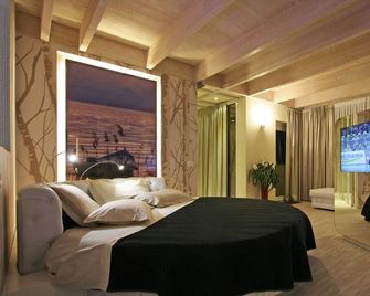 Ecohotel Primavera - Riva del Garda - Schlafzimmer