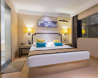 Baiyang Hotel - Xiangyang - Bedroom