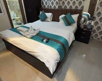 Hotel Shilva Inn - Varanasi - Makuuhuone