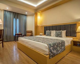 Golden Tulip Udaipur - อุไดปุระ - ห้องนอน