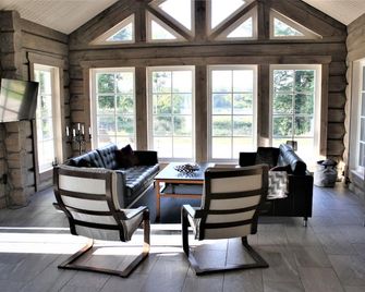 Cozy new built log house at lake with all extras - Perstorp - Sala de estar