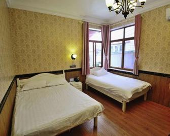 Fuxing No. 10 Hotel - Xiamen - Bedroom