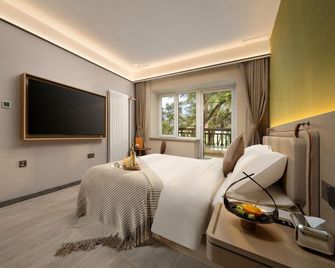 Banji Resort Hotel (Harbin Sun Island Scenic Area) - ハルビン - 寝室