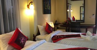 Villa Phathana Hotel - לואנג פראבאנג - חדר שינה