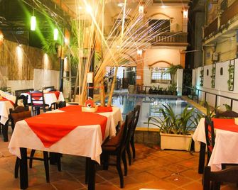 Tropical Breeze Guesthouse - Siĕm Réab - Ravintola