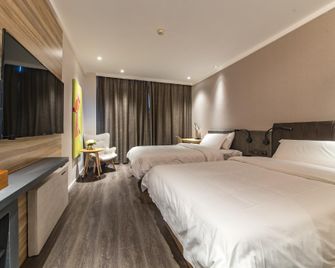 Hanting Premium Hotel Yancheng Xihuan Road - Yancheng - Schlafzimmer