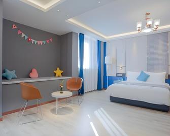 Lanou Hotel Taixing Wanda Plaza - Tchaj-čou - Ložnice