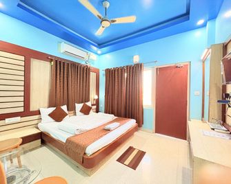 Hotel Swarna Villa puri - פורי - חדר שינה