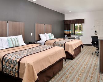 Scottish Inn & Suites - Conroe - Conroe - Schlafzimmer