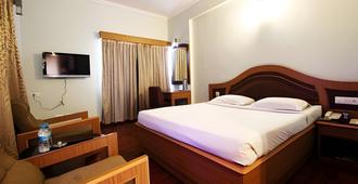 Hotel Park Plaza - Madurai - Bedroom