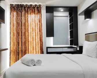 Chic And Cozy Studio At Vida View Apartm - Makasar - Sypialnia