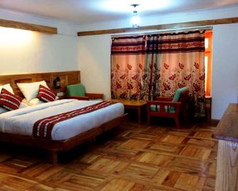 تي آي آيتش جلوبال فاميلي ريزورت - سابو - لي - ليه - غرفة نوم