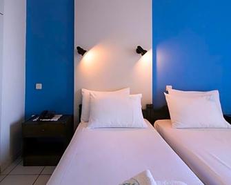 Anesis Hotel - Agios Ioannis - Schlafzimmer