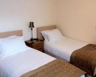 Churchills Inn & Rooms - Windermere - Yatak Odası