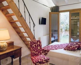 Leano Agriresort - Superior Triple Room with Mezzanine - Piazza Armerina - Bedroom